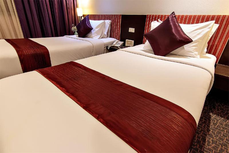 Bossotel Bangkok Room photo