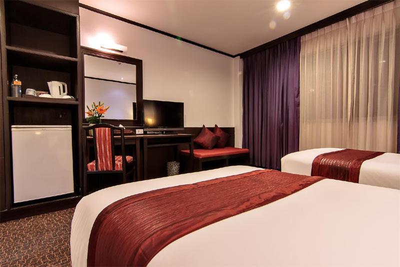 Bossotel Bangkok Room photo